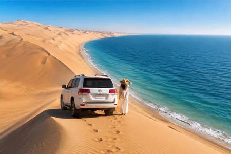 DOHA :Half Day Desert Safari Sandboarding Camel & Inland sea Tour
