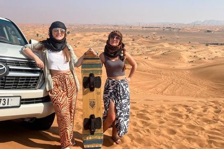 Private Evening Desert Safari Premium Camp: BBQ Camel & Sandboard