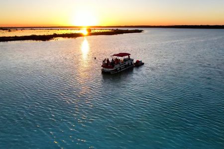 Private charter on pontoon Laguna de los Siete Colores Bacalar
