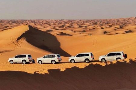 Qatar Shared Desert Safari with Sandboarding and Camel Ride