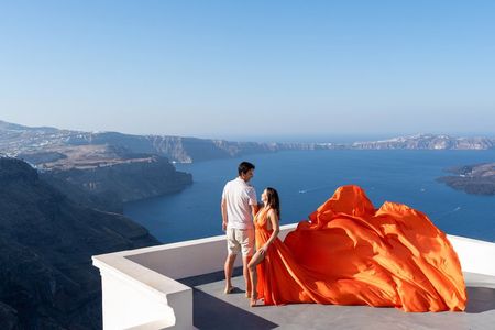 Romantic Couple Flying Dress Photoshoot in Santorini