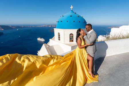 Romantic Couple Flying Dress Photoshoot in Santorini