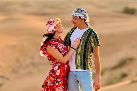 Dubai Layover Desert Escape: Red Dunes Safari, Camel Ride, & BBQ