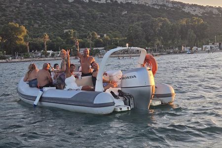 Cagliari sunset by dinghy , stops , dives , pizza and spritz