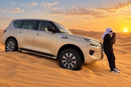 Dubai Red Dunes Desert Safari Camel Ride BBQ Dinner and Shows