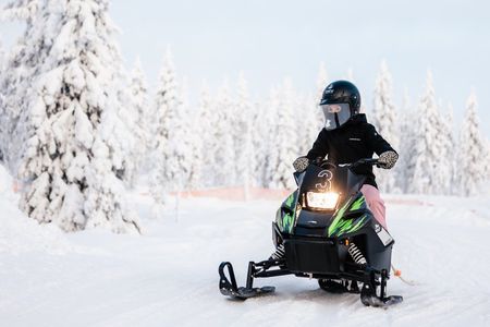 Lapland Winter Park Mini snowmobile fun for kids in Rovaniemi