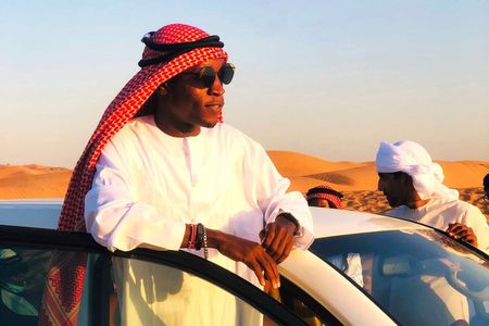 Abu Dhabi Layover Desert Escape: Safari, Camel Ride, & BBQ Dinner