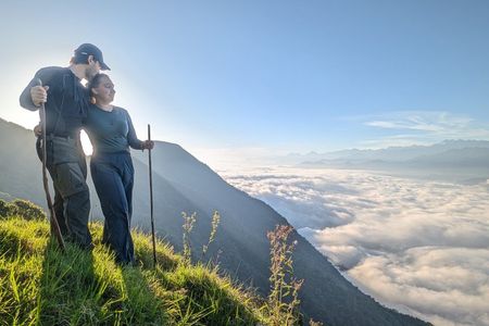 Hike above the clouds on a guided mountain trek.