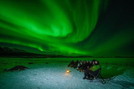 Northern Lights Small-Group Tour with Photos, Snacks & Snowsuits