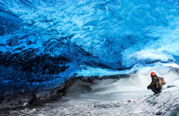 Crystal blue ice cave tour from Jökulsárlón with a super Jeep