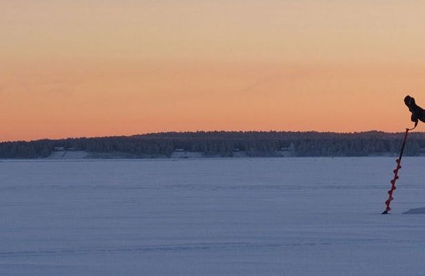 Guided ice fishing experience in Luleå