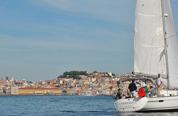 Lisbon old town sailing cruise with a welcome drink