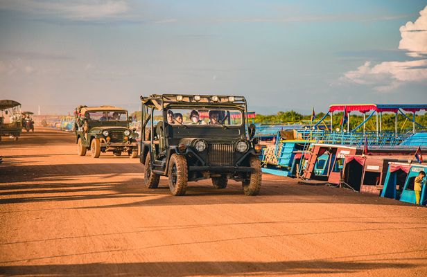 Exploration of floating village by 4x4 and sunset boat tour