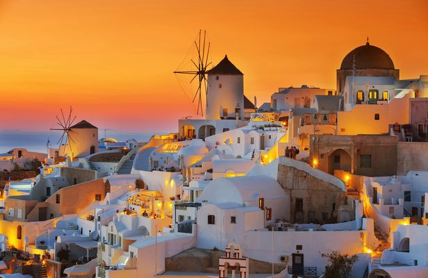 Volcanic islands sunset dinner cruise in Santorini
