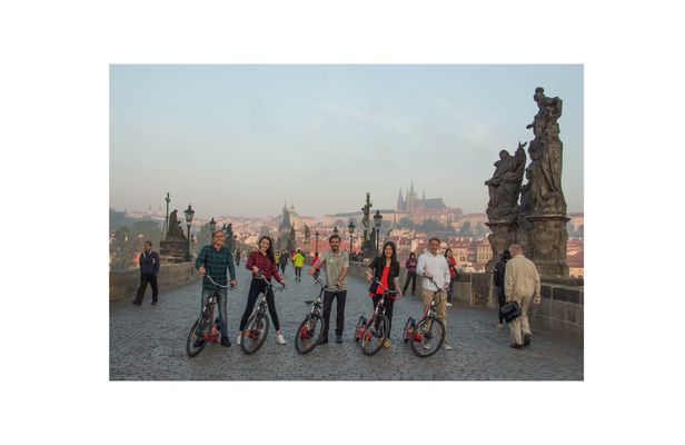 Small group e-scooter viewpoints tour with a pickup in Prague
