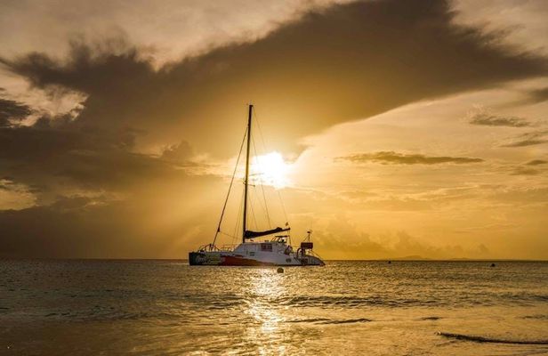Irie catamaran sailing experience at sunset