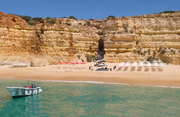 Guided boat trip with extra swimming time and beach BBQ from Albufeira