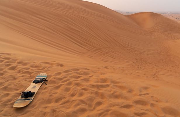 Sandboarding and secret paradise valley full-day tour with pickup