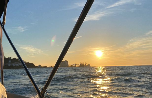 Sightseeing cruise with glass of champagne in Lisbon