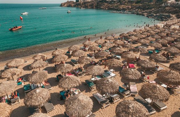 Middle rows seaside sunbed rental in Super Paradise Beach Mykonos