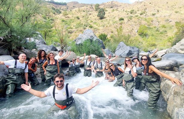 River trekking guided experience in the Alcantara Gorges