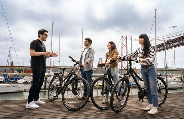 Lisbon bike tour, Tagus cruise and helicopter flight