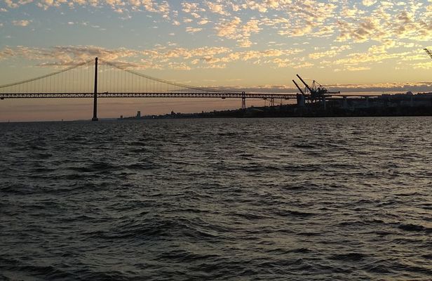 Sunset boat tour in Lisbon on Tagus estuary