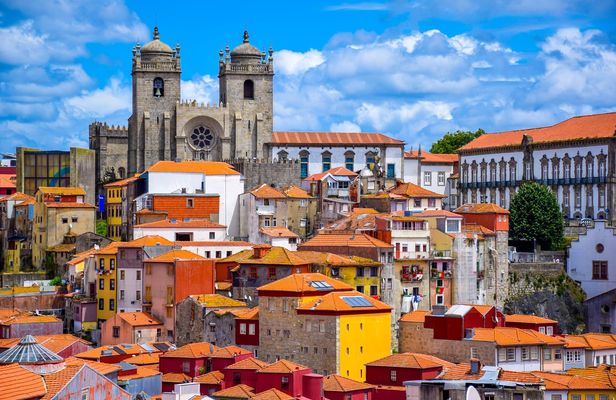 Porto tour by tuk-tuk and port wine cellar guided tour with tastings
