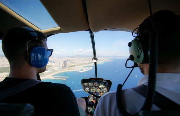 Helicopter Flight and Sailing Experience in Barcelona