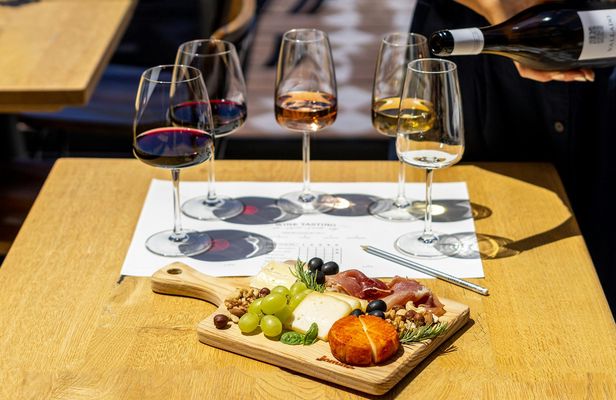 Porto Wine Tasting Experience with Portuguese Cheese and Ham Plate