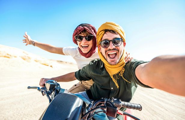 Quad sunset with barbecue and camel riding in Marsa Alam