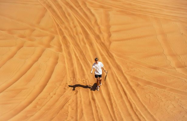 Sandboarding In Sahara Dunes With Sunset Camel Ride And BBQ