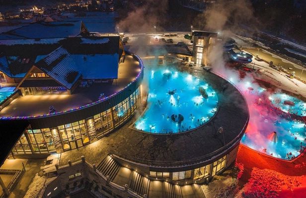 Snowmobile Ride with Thermal Pools from Krakow with Pickup
