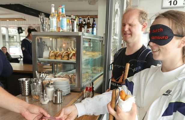 Blind city walking tour in Hamburg guided by a blind person