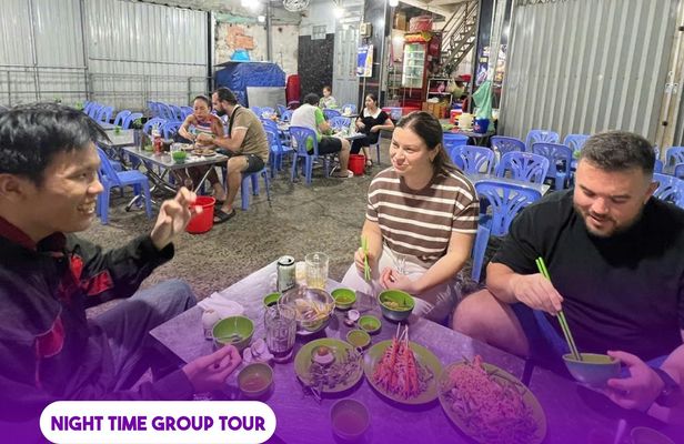 Ho Chi Minh City local food evening tour by motorbike