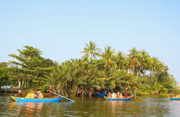 Boat tour on the Cổ Cò River with traidtional snack