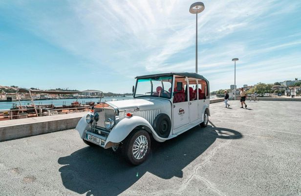 Electric vehicle tour of Porto with wine tasting and river cruise