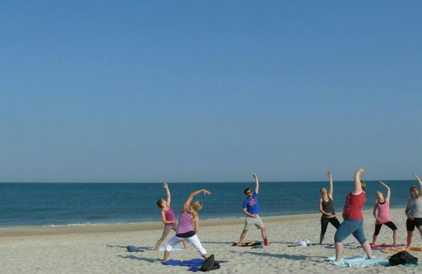 Yoga session on the beach of the island of Sylt