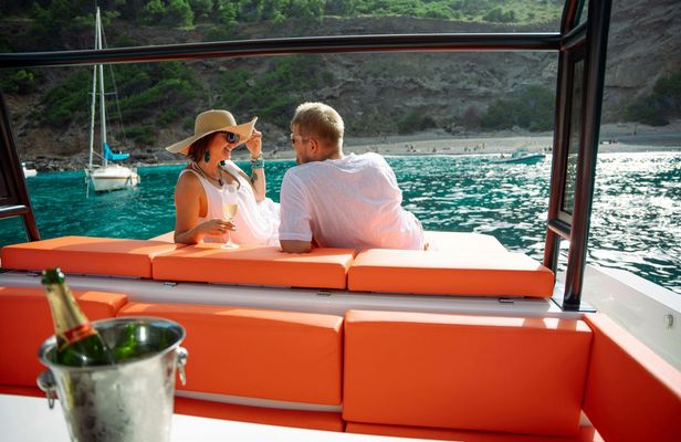 Coastline sunset cruise with a glass of cava