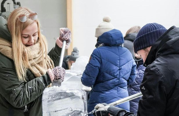Ice sculpting workshop and dinner by the fire in Rovaniemi