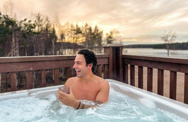 Finnish sauna and outdoor hot tub experience with dinner by the fire