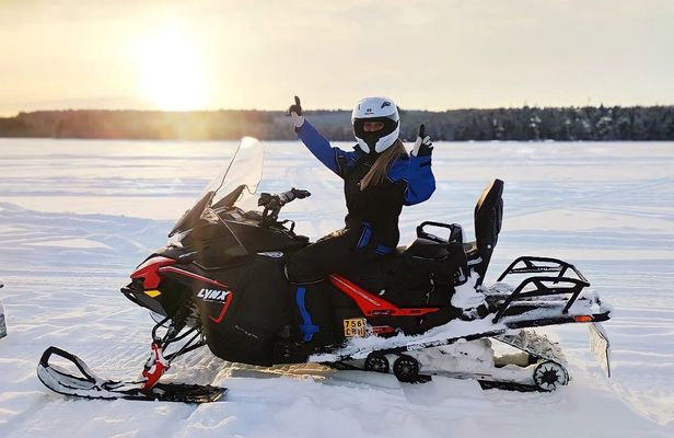 Snowmobile small-group winter safari with BBQ from Rovaniemi