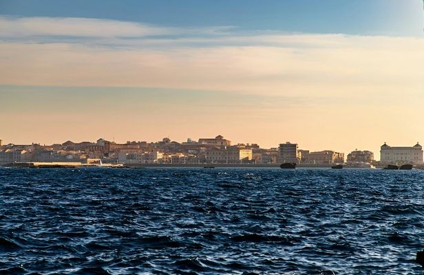 Ortigia coastline exploration by private boat with seafood appetisers