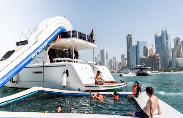 Yacht sailing with waterslides and BBQ from Dubai Harbour