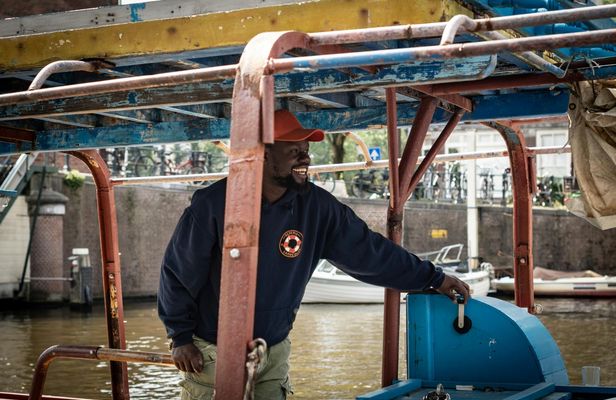 Canal cruise on a wooden refugee boat