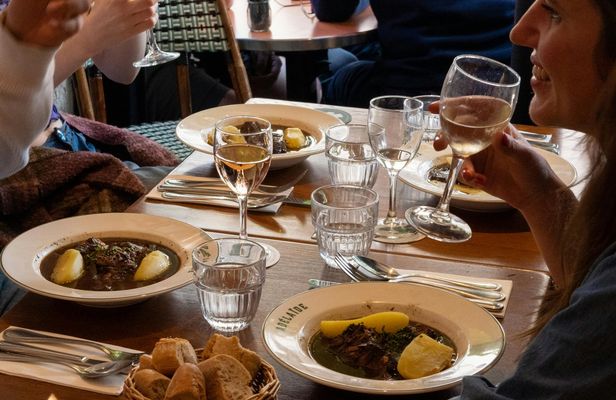 Traditional food tour in Montmartre neighborhood
