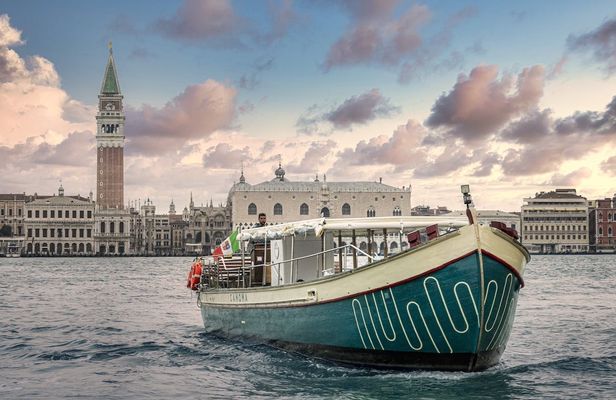 Murano, Burano and Torcello, the Venetian lagoon on a traditional boat