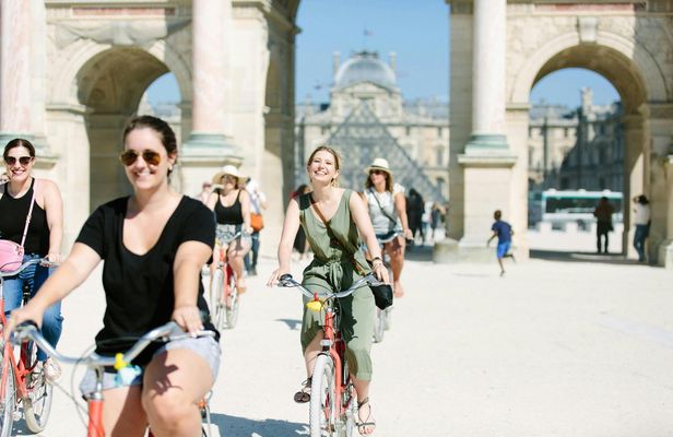 Paris highlights bike tour and Seine river cruise