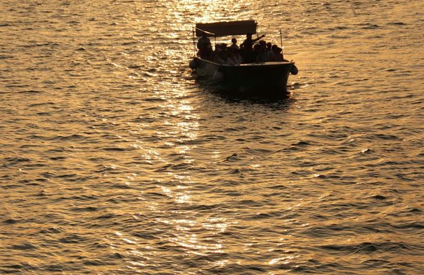 Sunset by boat in Terrasini with aperitif and swimming