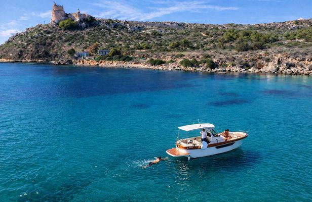 Cagliari small-group boat escape to Sella del Diavolo with swim stops